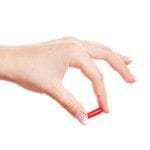 hand with a pill