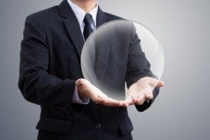 businessman Hand holding a crystal Ball