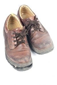 Men's Old Shoes Isolated on White "How about a shine?"